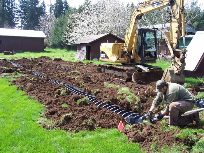 A residential septic system being installed.
